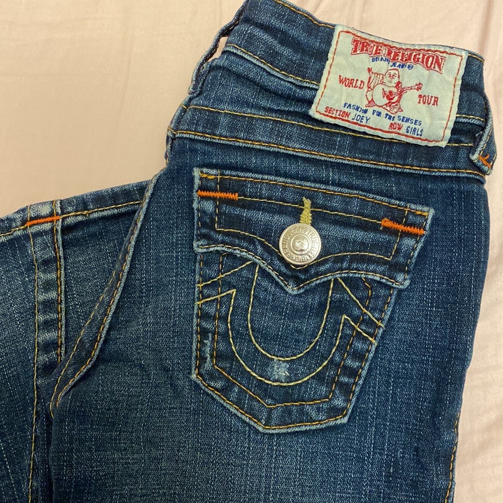 Girls size 7 True Religion jeans, super cute, worn once then out grew.